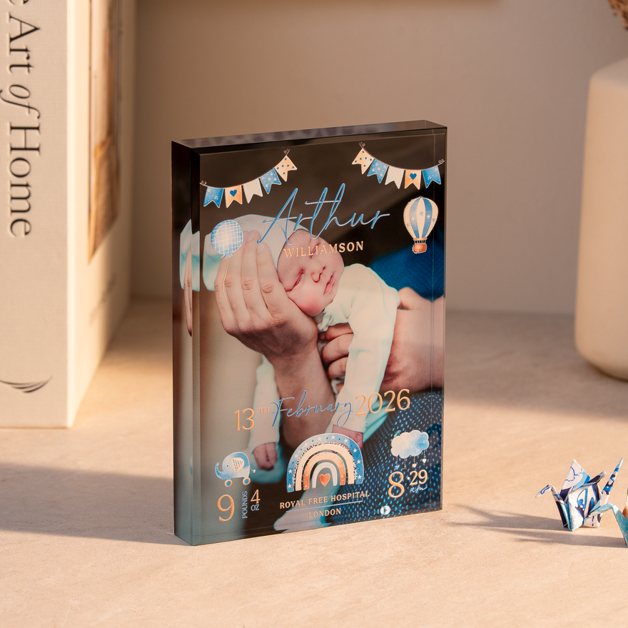 A finished Baby Tribute Block at home, showing a newborn photo with birth details
