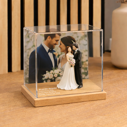 Wedding Memory Display case with a wooden base, featuring a couple and flowers.