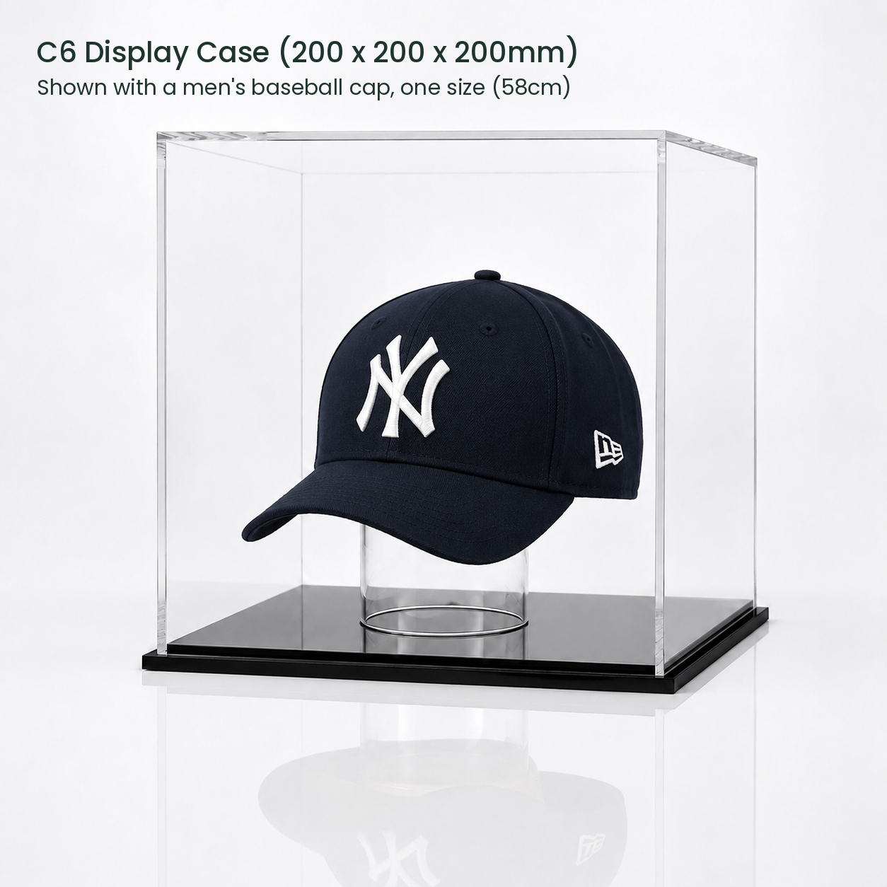 C6 display case, 200mm cube, shown with a men's baseball cap